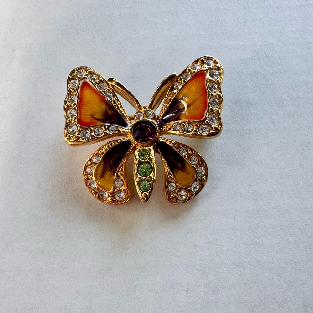 Joan Rivers butterfly pin